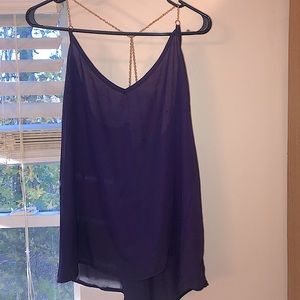 Purple blouse with gold chain straps
